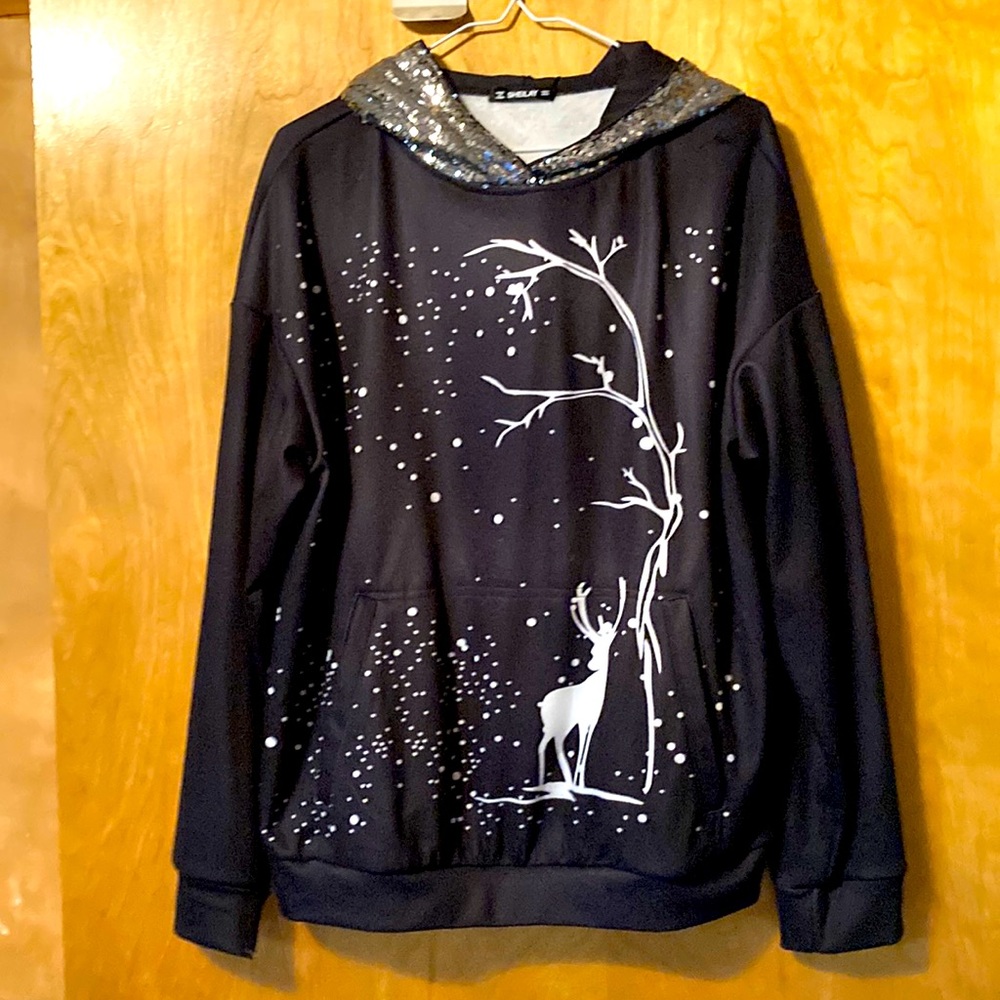 Brand new hoodie with woods/ deer scene silver sequin